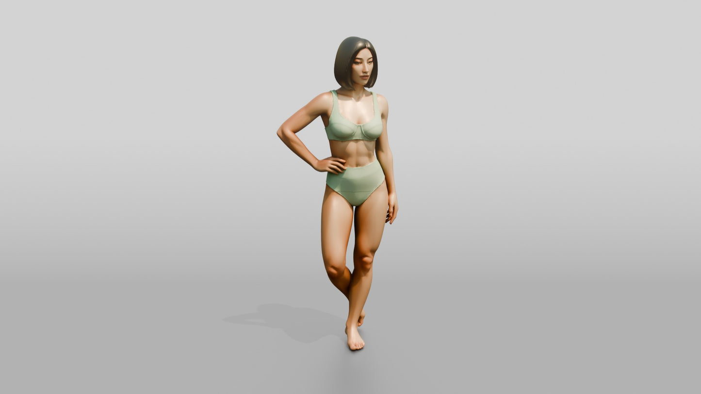 Woman in Mint Two-Piece Swimsuit with Hand on Hip
