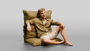 Man Reclining on a Lounge Cushion - 3D character model, view 1