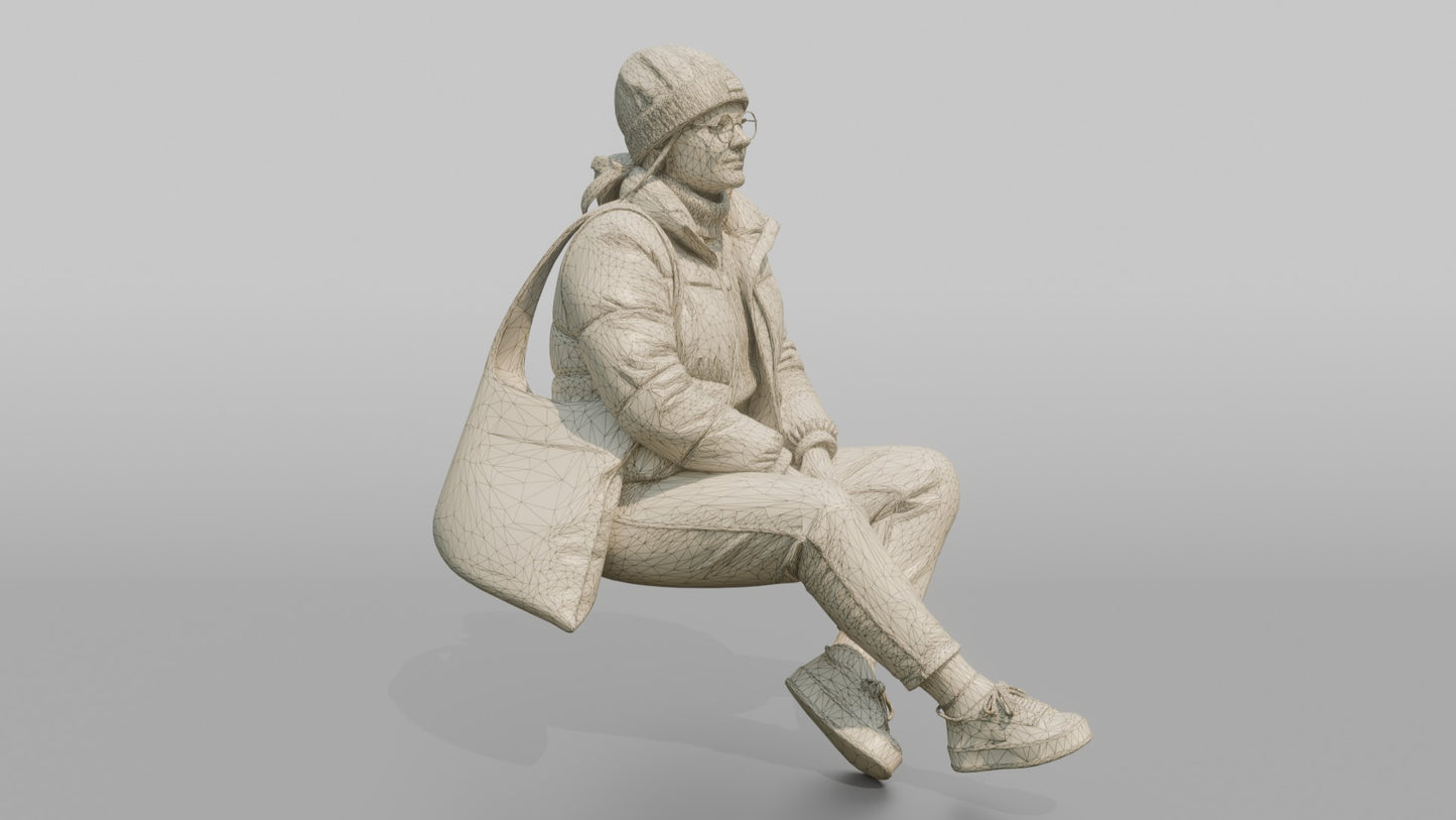 Scandinavian Teenage Girl Sitting in a Puffer Jacket