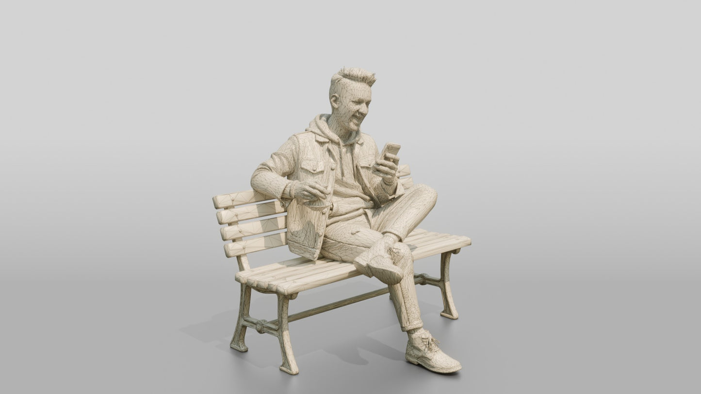 Man Laughing While Texting with Tea