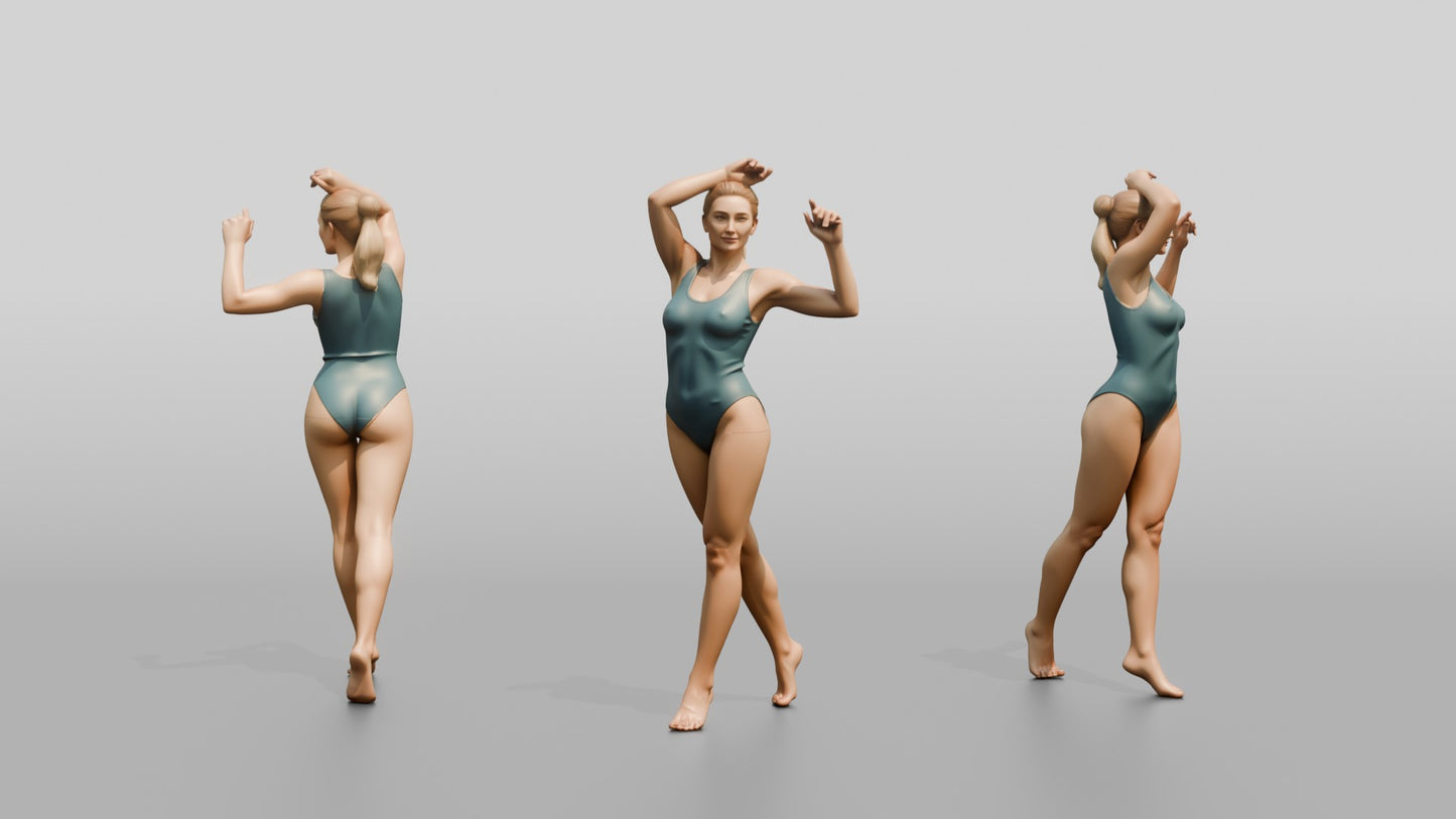 Woman in Teal Swimsuit in a Dancing Pose