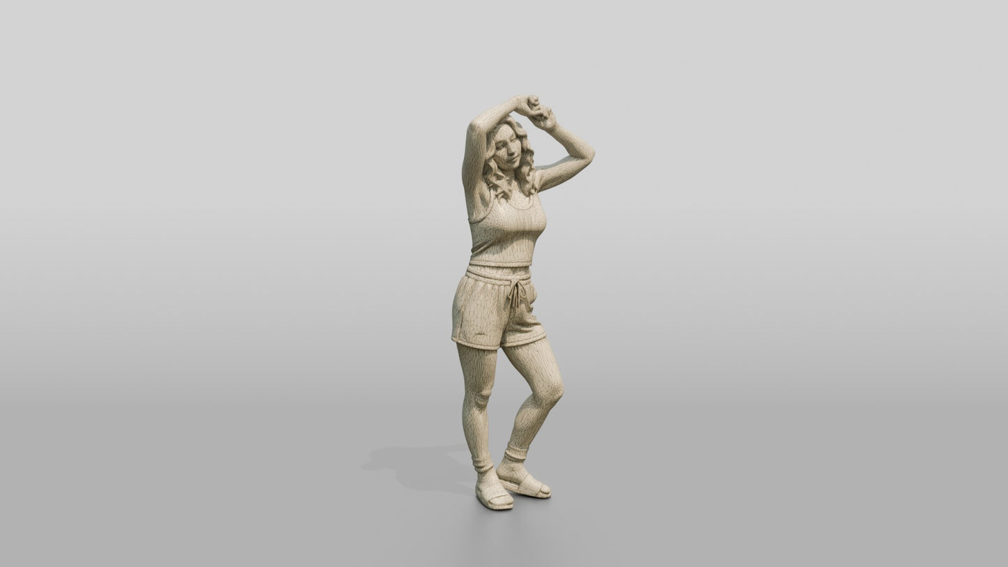 Woman Running Hands Through Wavy Hair in Cream Outfit