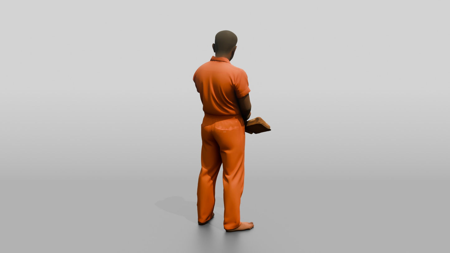 South Asian Male Prisoner Holding a Worn Book Open in One Hand