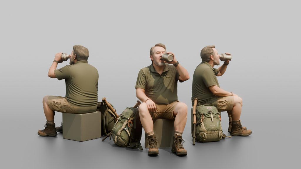 Hiker Sitting and Drinking from a Canteen