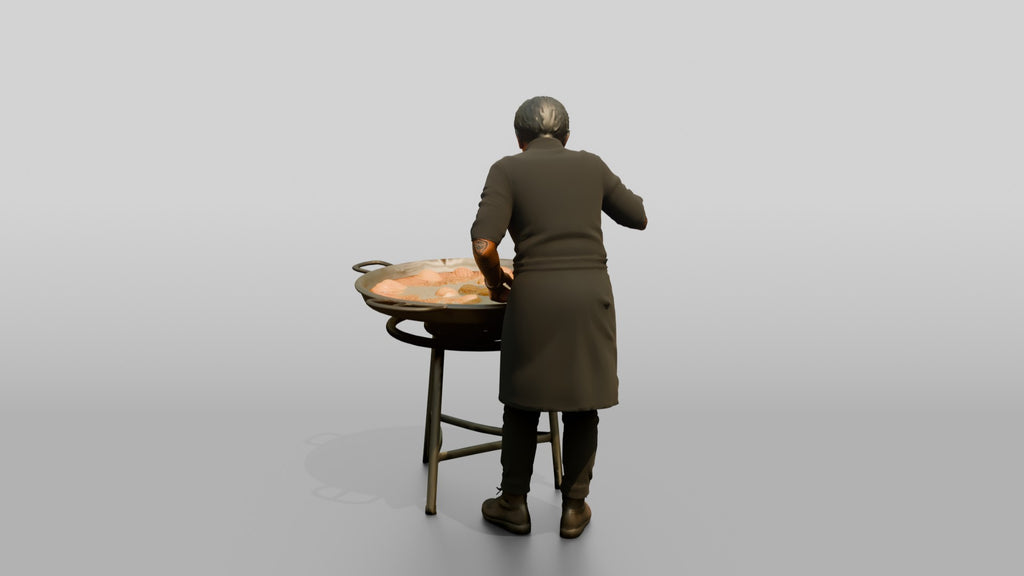 Chef Checking a Paella Pan