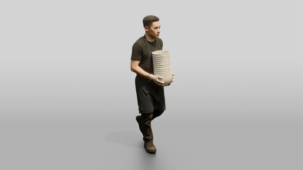 Kitchen Porter Carrying Ceramic Bowls