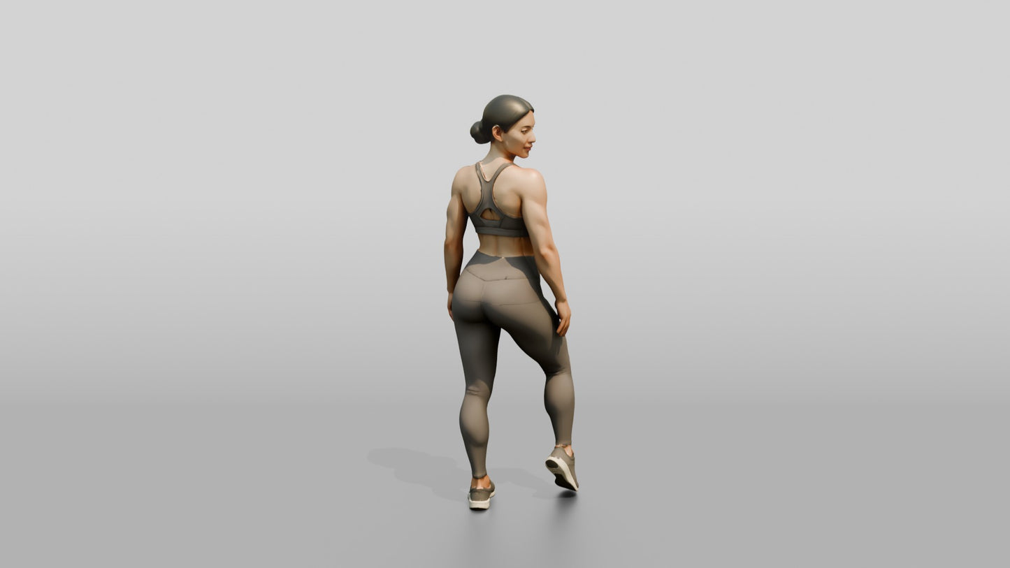 Woman in Taupe Activewear Glancing Over Her Shoulder