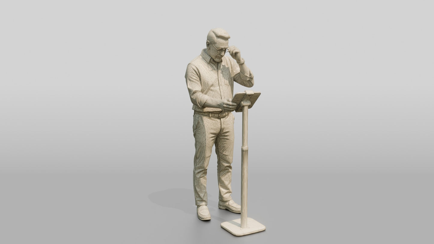 Businessman at a Standing Desk with a Tablet