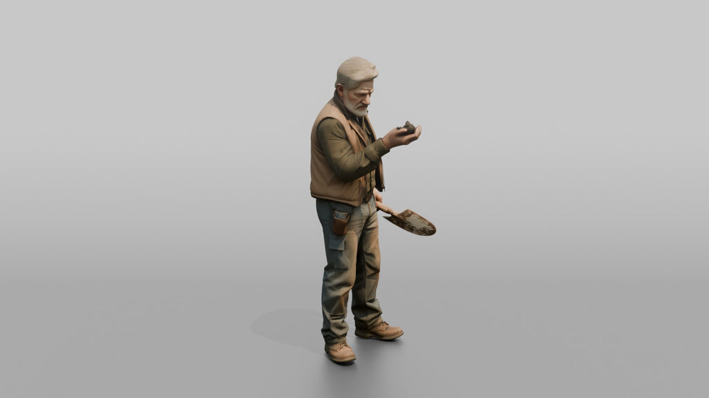 Farmer Inspecting Handful Of Freshly Plowed Rich Black