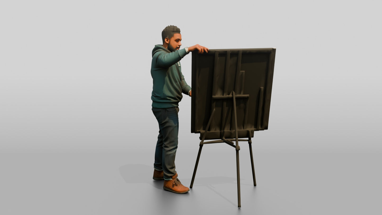Man Presenting Artwork on an Easel