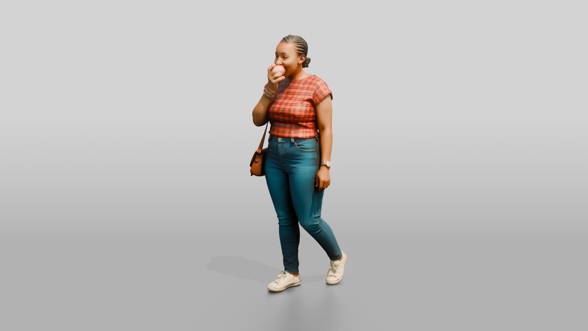 African Woman Eating an Apple in a Plaid Top