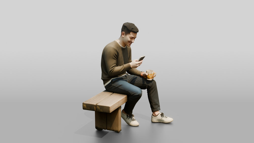 Young Chinese Man Relaxing on a Bench with Phone