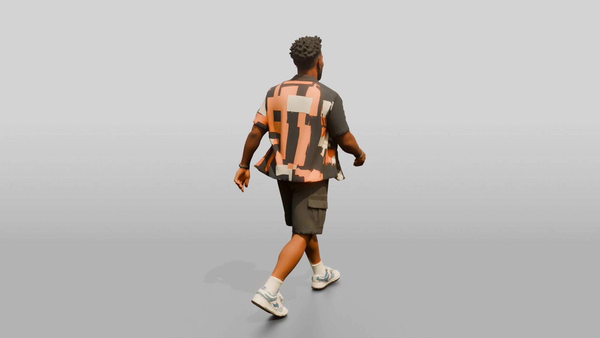African-American Man Walking Dynamically in Patterned Shirt