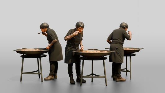 Chef Checking a Paella Pan