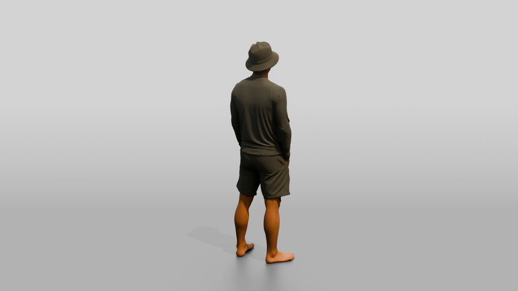 Man Standing With Hands in Pockets