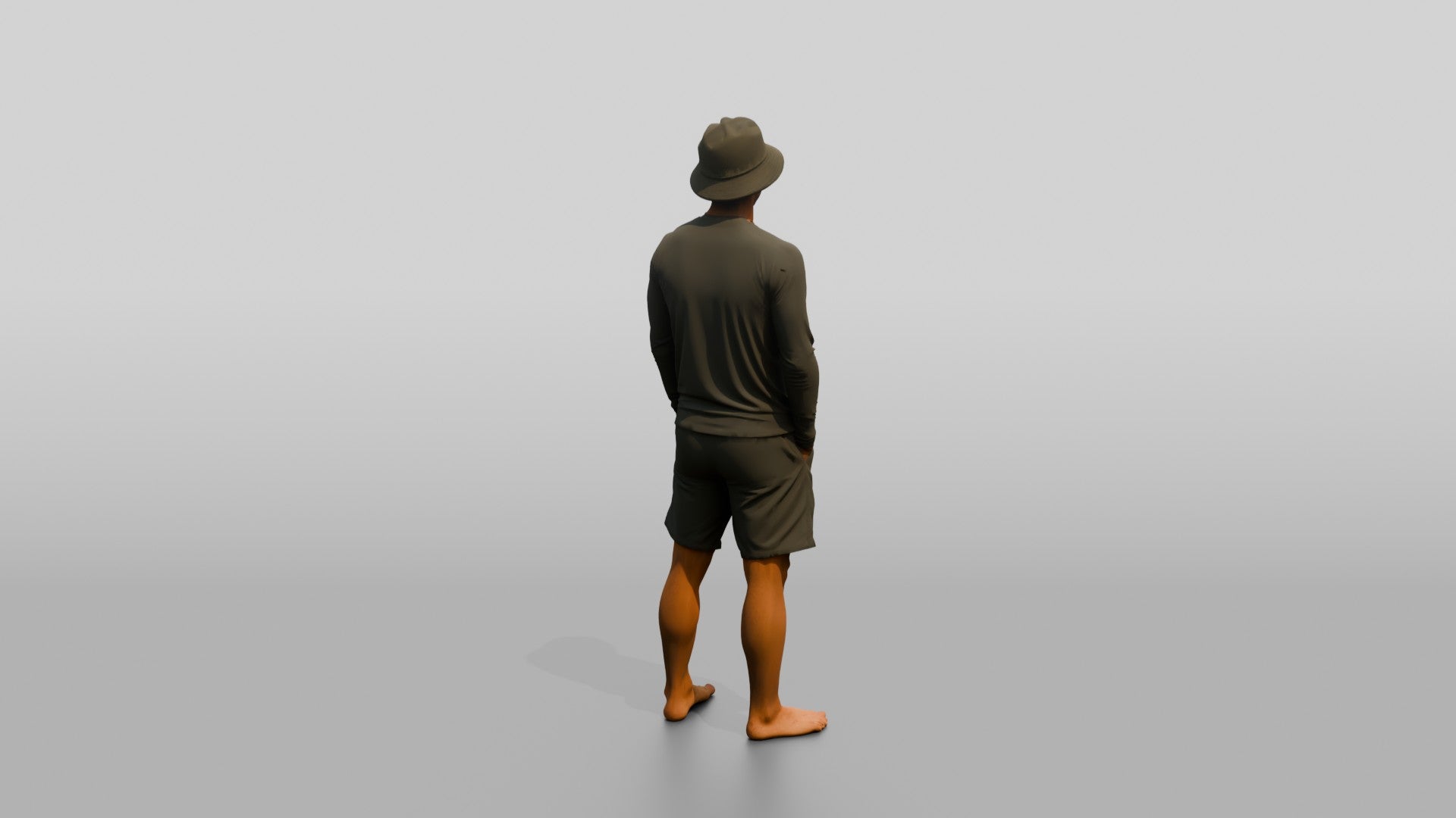 Man Standing With Hands in Pockets