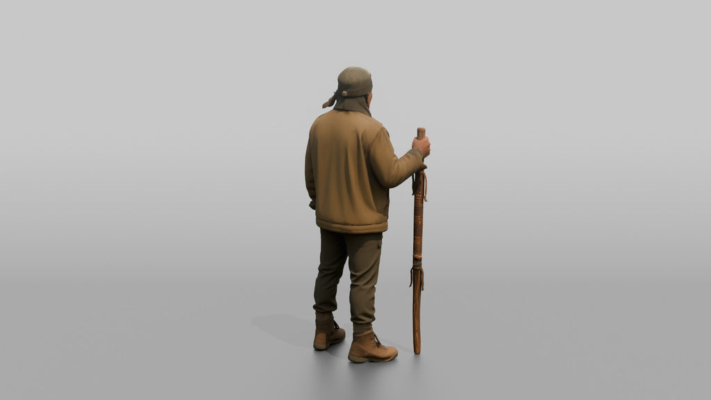 Hiker Holding a Carved Wooden Walking Stick