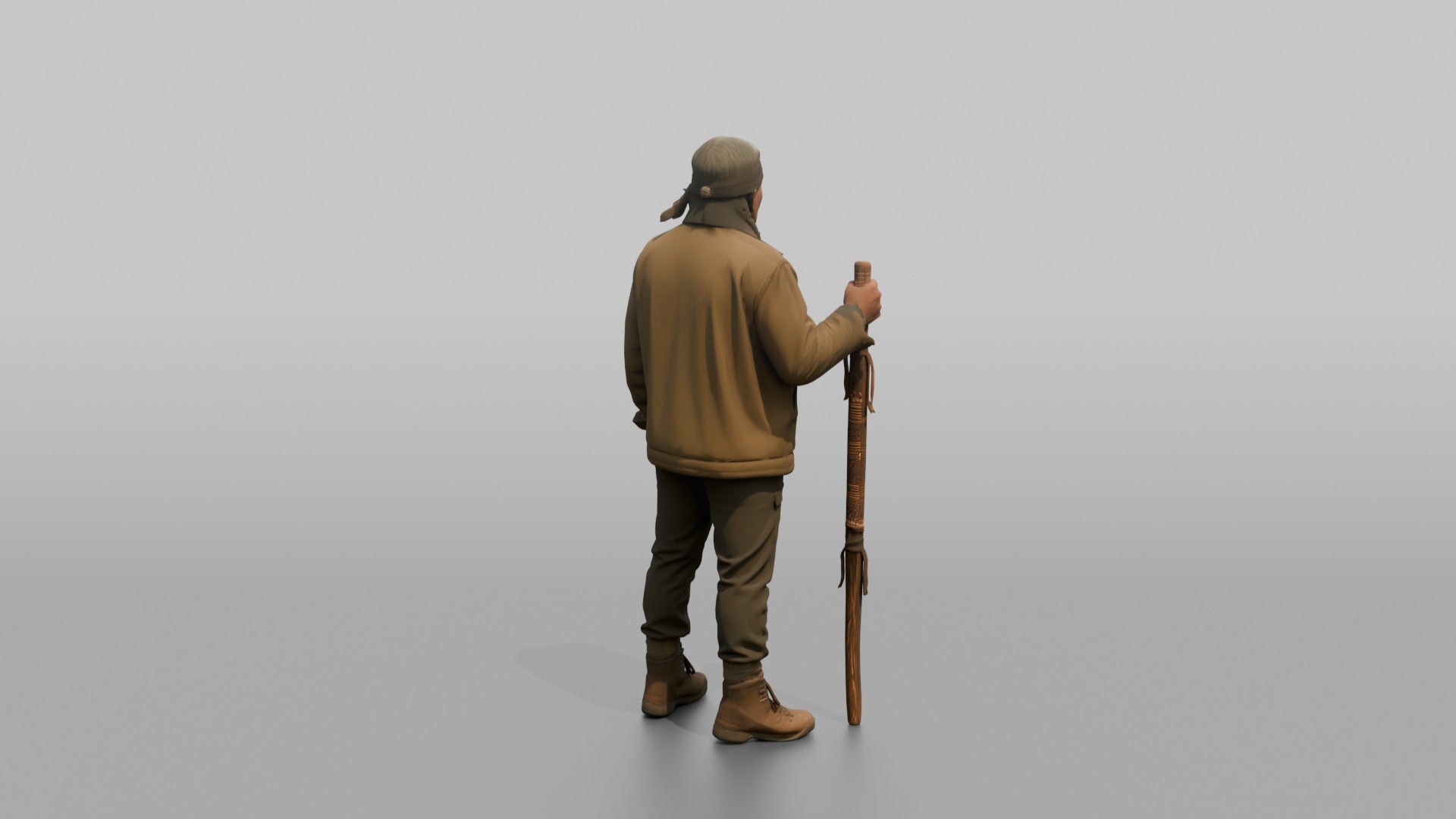 Hiker Holding a Carved Wooden Walking Stick