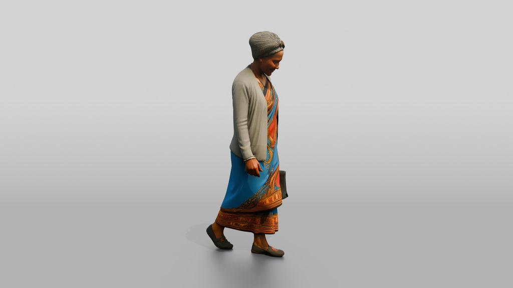 Elderly African Woman in a Colorful Khanga Dress