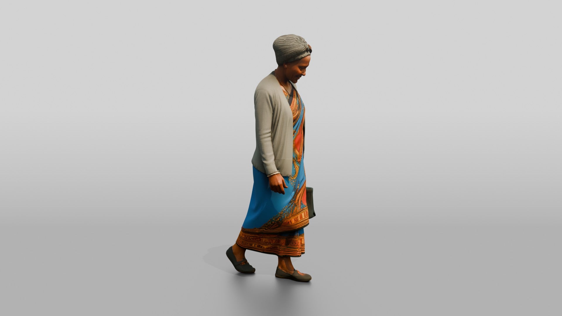 Elderly African Woman in a Colorful Khanga Dress