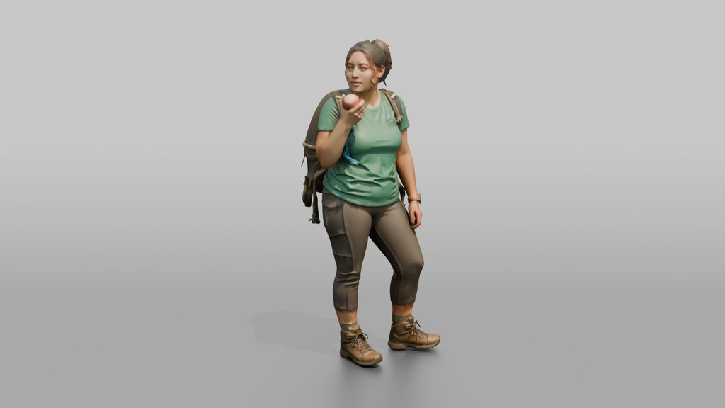 Hiker Eating an Apple on the Trail