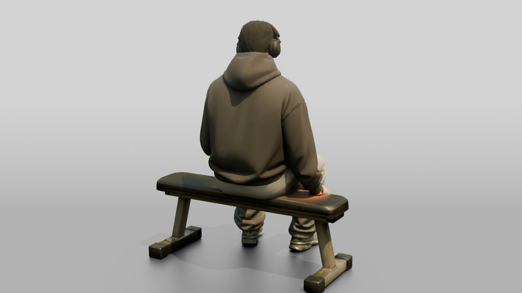 Man Sitting Checking Smartphone