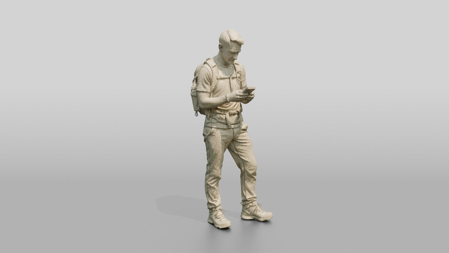 Man Checking Trail Map on Phone
