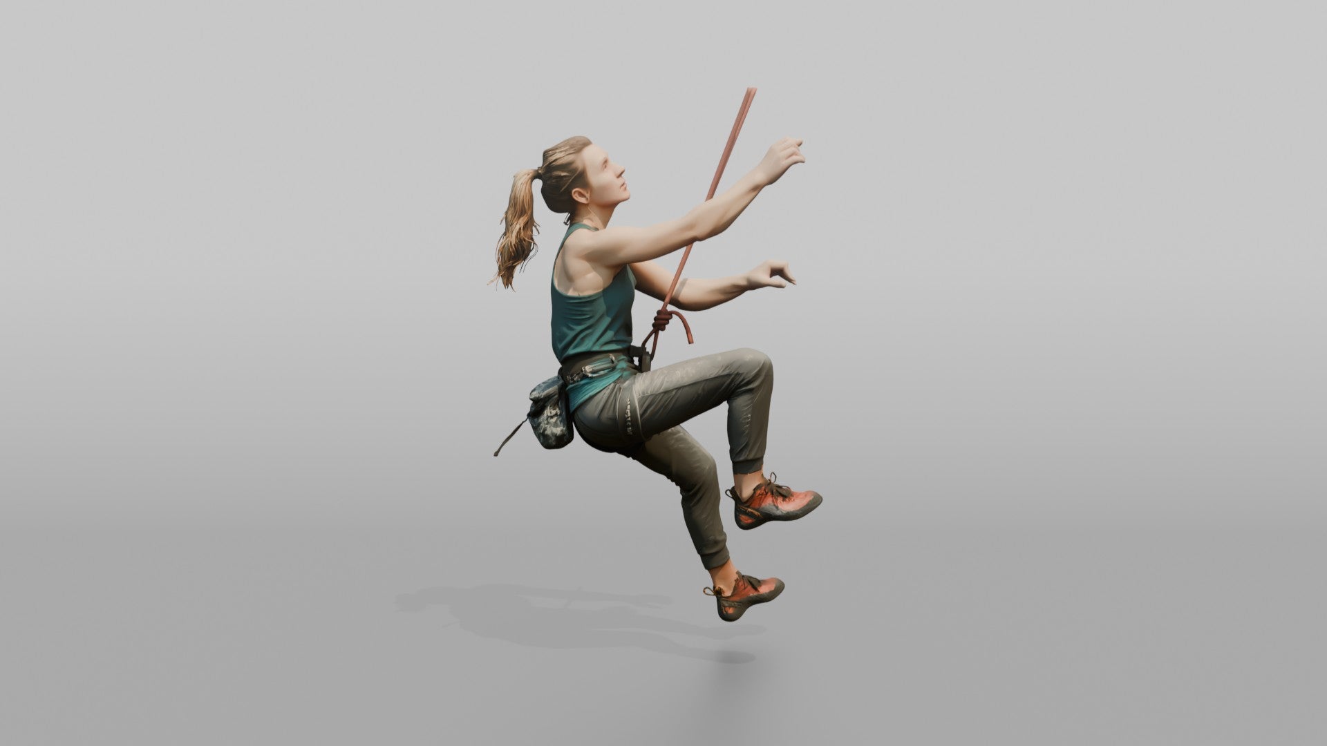 Rock Climber Reaching Upward Mid-Climb