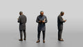 African Man in a Senator-Style Suit Checking His Phone