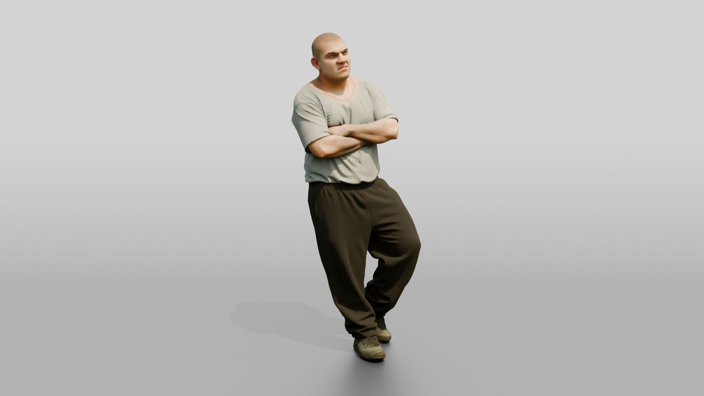 Latino Male Prisoner in a Grey T-shirt and Black Sweatpants