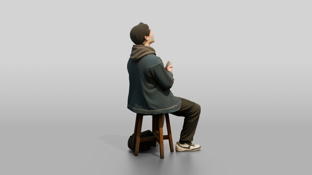 Asian Man Laughing at Phone