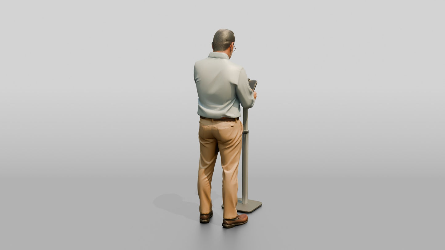 Businessman at a Standing Desk with a Tablet