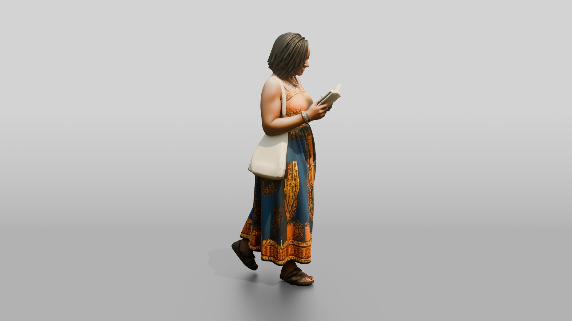 African Woman Reading a Book in a Printed Maxi Dress