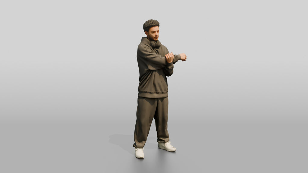 Man Stretching Arms in Oversized Hoodie