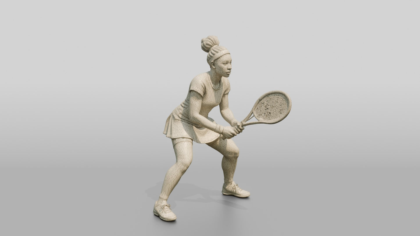 Female Tennis Player Poised to React at the Baseline