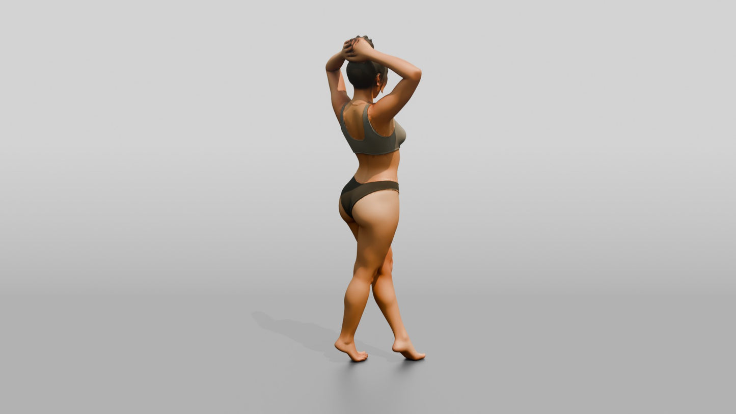 Woman in Black Two-Piece Swimsuit with Arms Raised