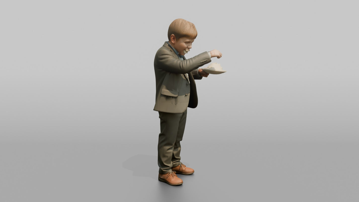 Young Boy Eating a Slice of Wedding Cake