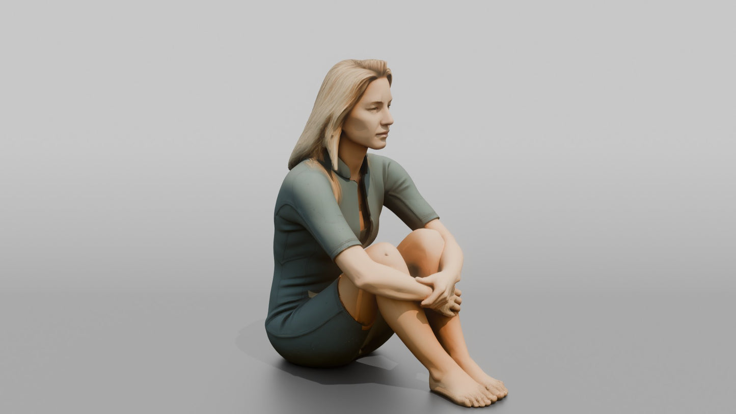 Surfer Sitting and Hugging Her Knees