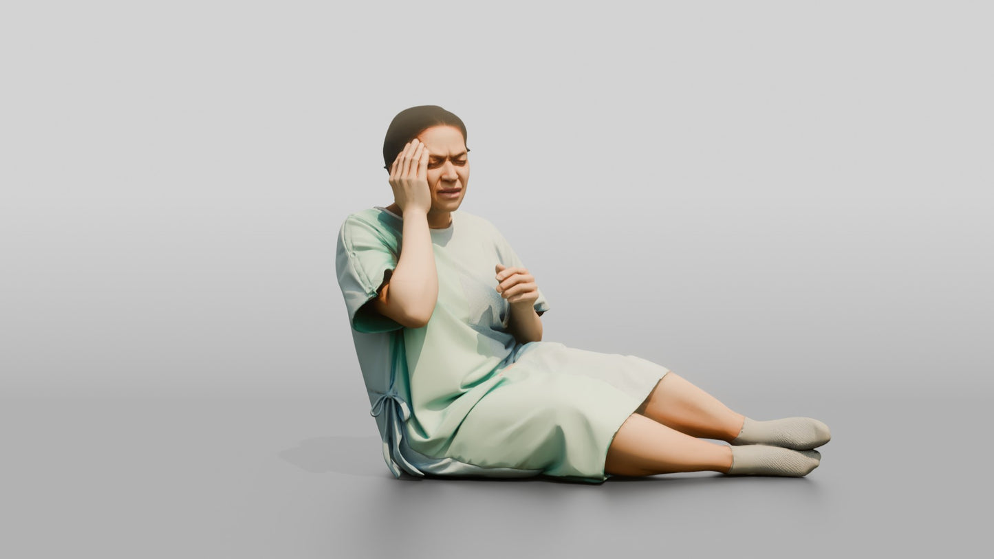 Woman Patient Sitting with a Headache
