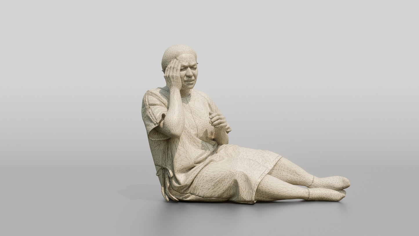 Woman Patient Sitting with a Headache