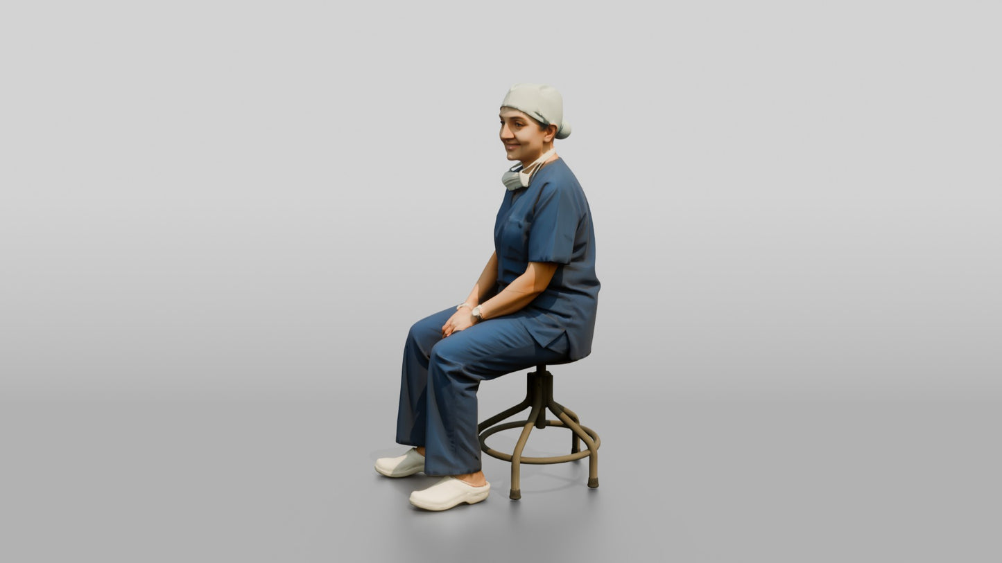 Middle-Aged South Asian Woman Doctor Sitting on Stool