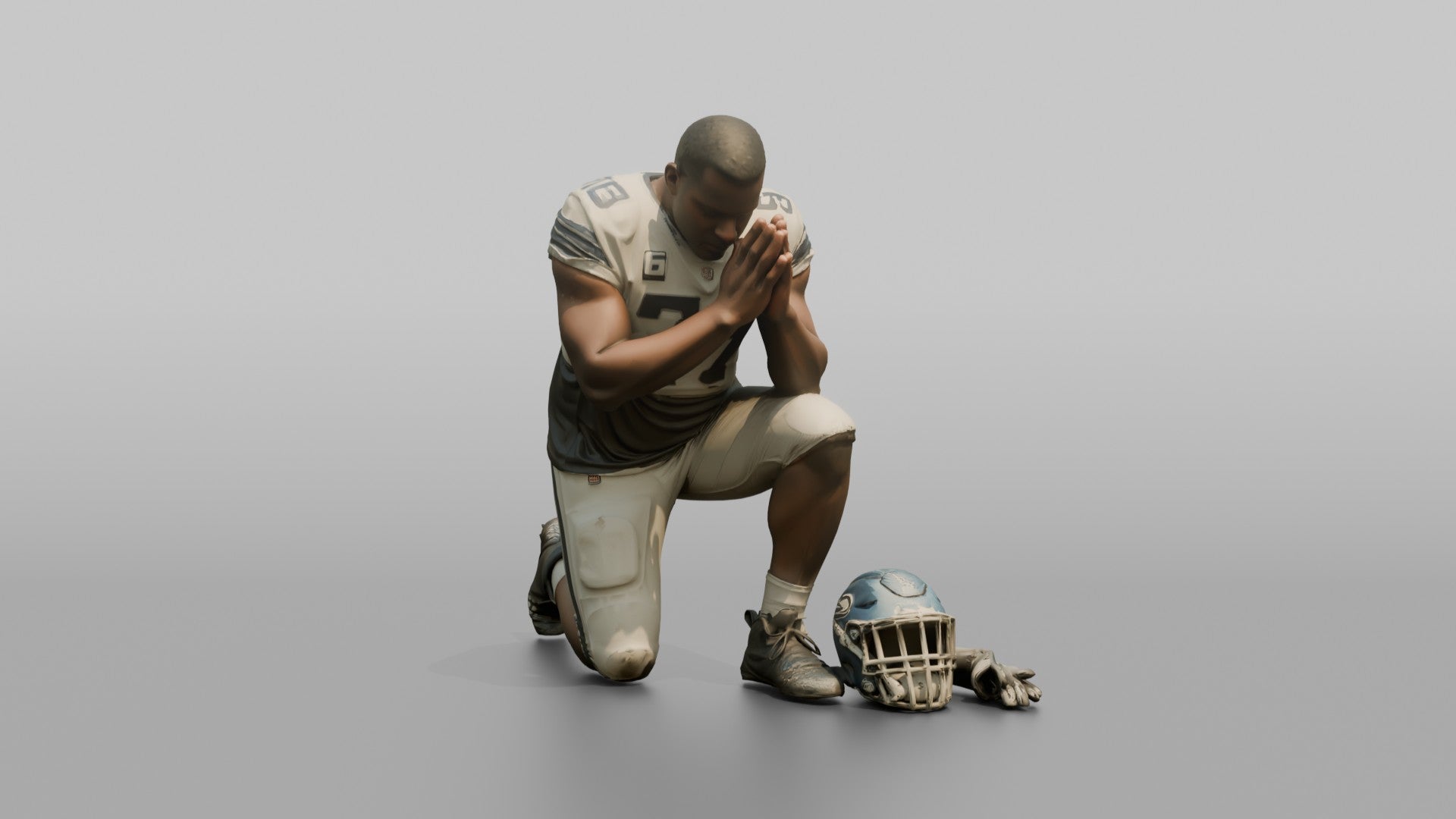 Player Kneeling in Prayer Before the Game