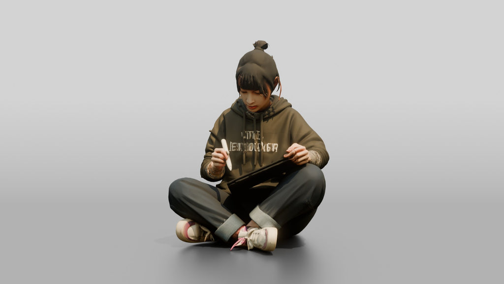 Asian Woman Sketching on Digital Tablet