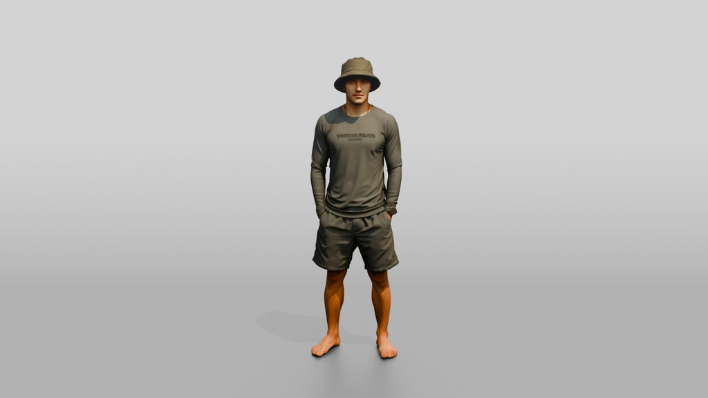 Man Standing With Hands in Pockets