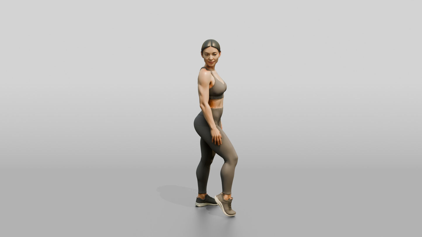 Woman in Taupe Activewear Glancing Over Her Shoulder
