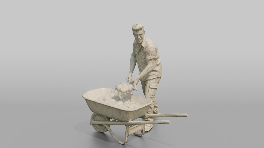 Farmer Shoveling Manure Into Wheelbarrow