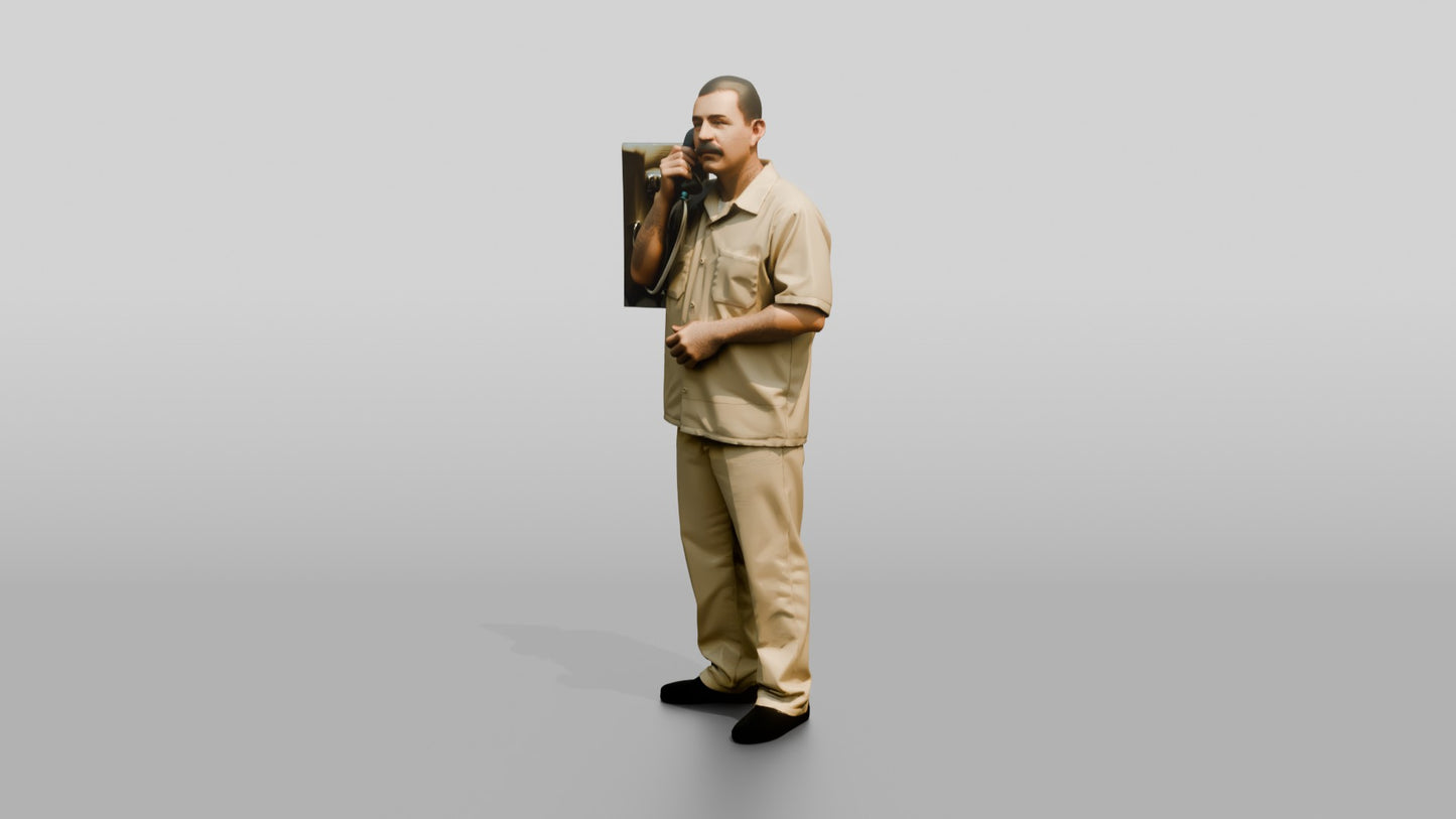 Latino Male Prisoner in a Khaki Uniform Holding a Phone Receiver