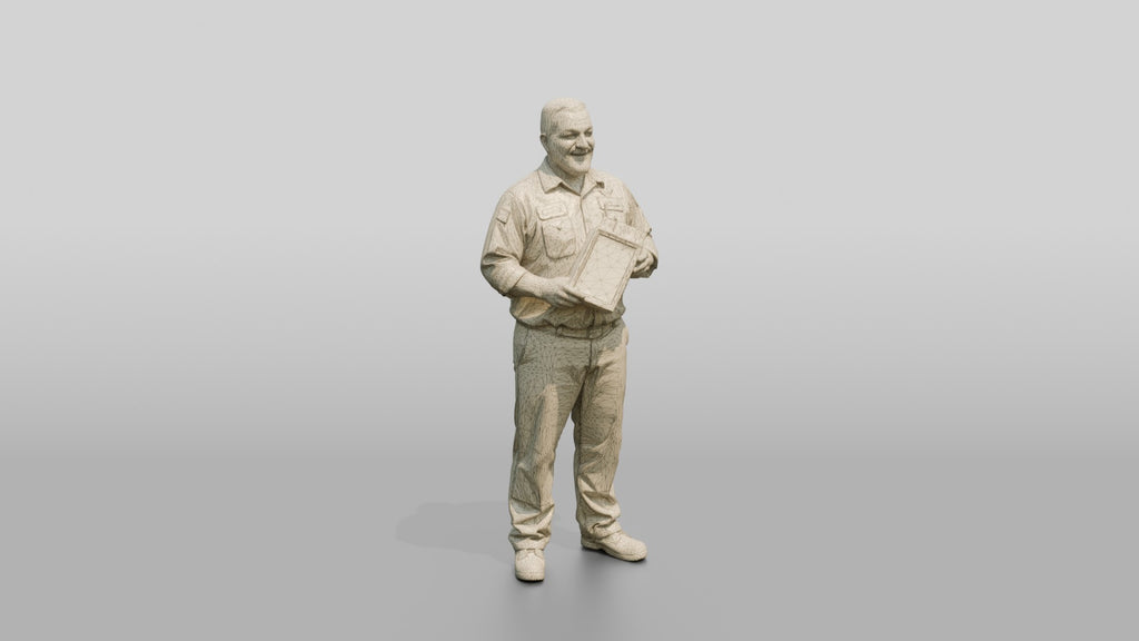 Mechanic Holding a New Air Filter