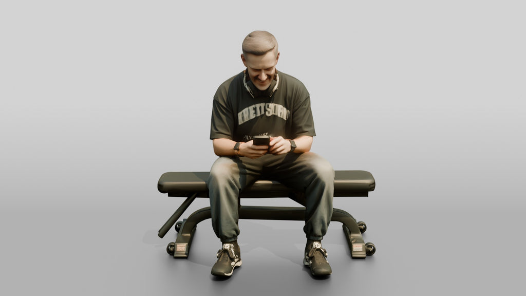 Man Sitting on Weight Bench