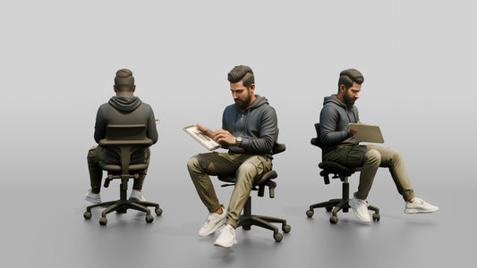 Man Working at a Desk with Monitors